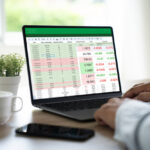 businessman working with data and graphs in spreadsheet documents for online analysis Microsoft Excel project dashboard accounting digital